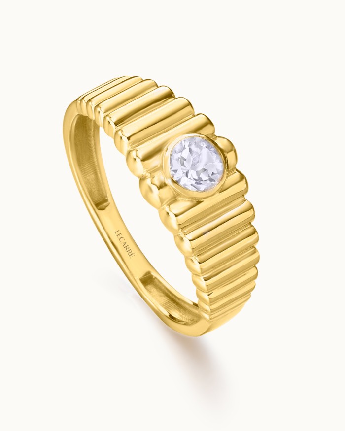 Anillo Gluttony gallonado de oro 18K con topacio blanco | LECARRE